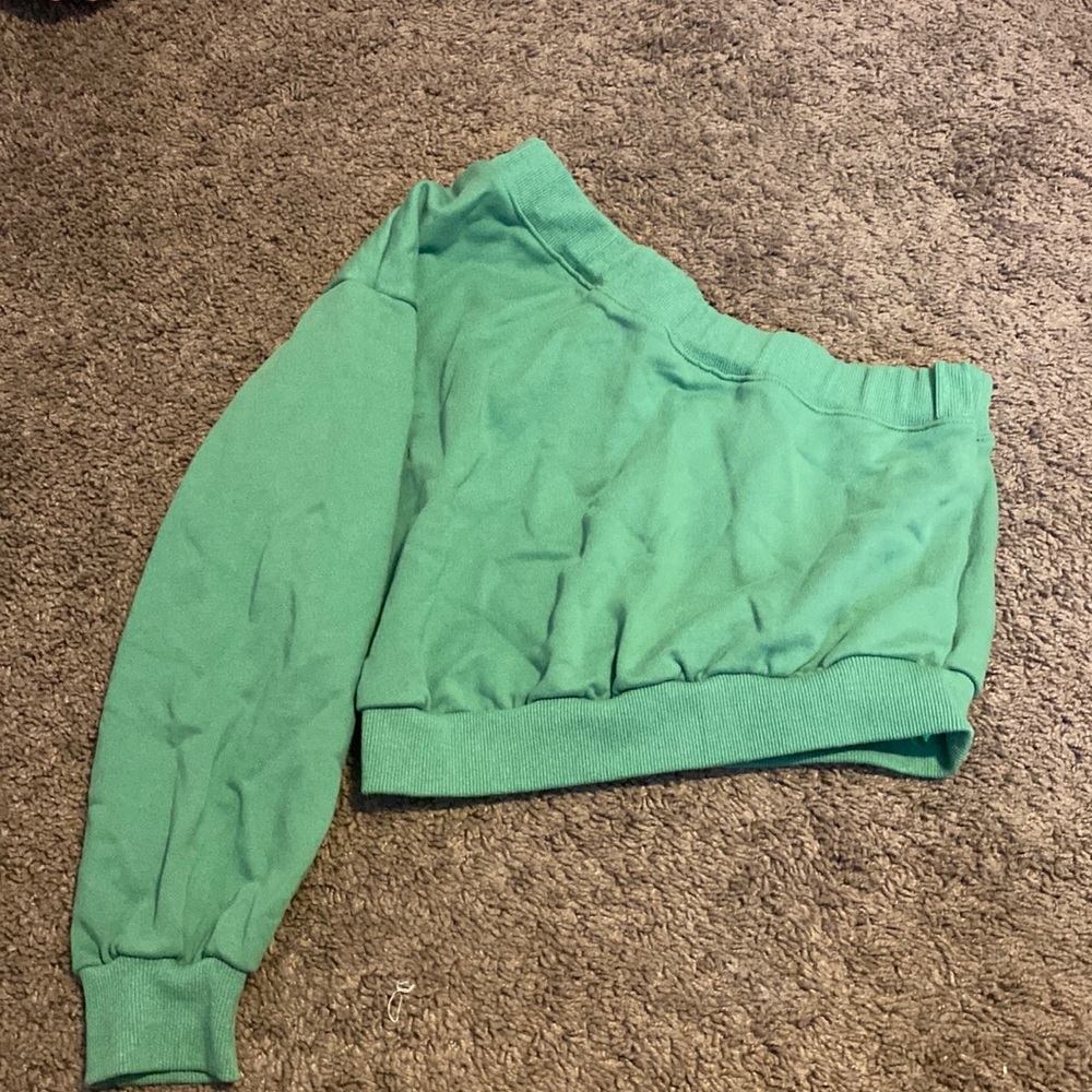 One shoulder long sleeve top.
